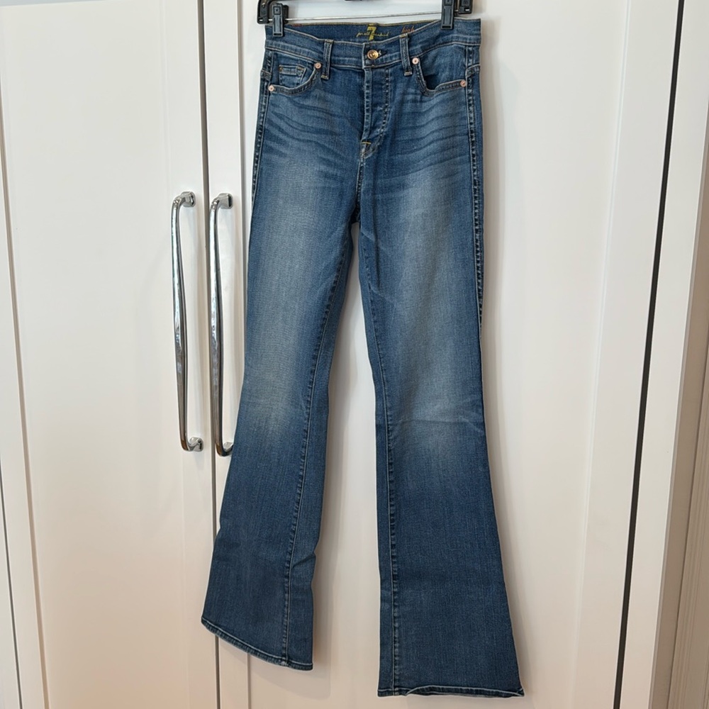 7 For All Mankind. 98% cotton, 2% spandex. Size 26. Button fly. Bootcut jeans.